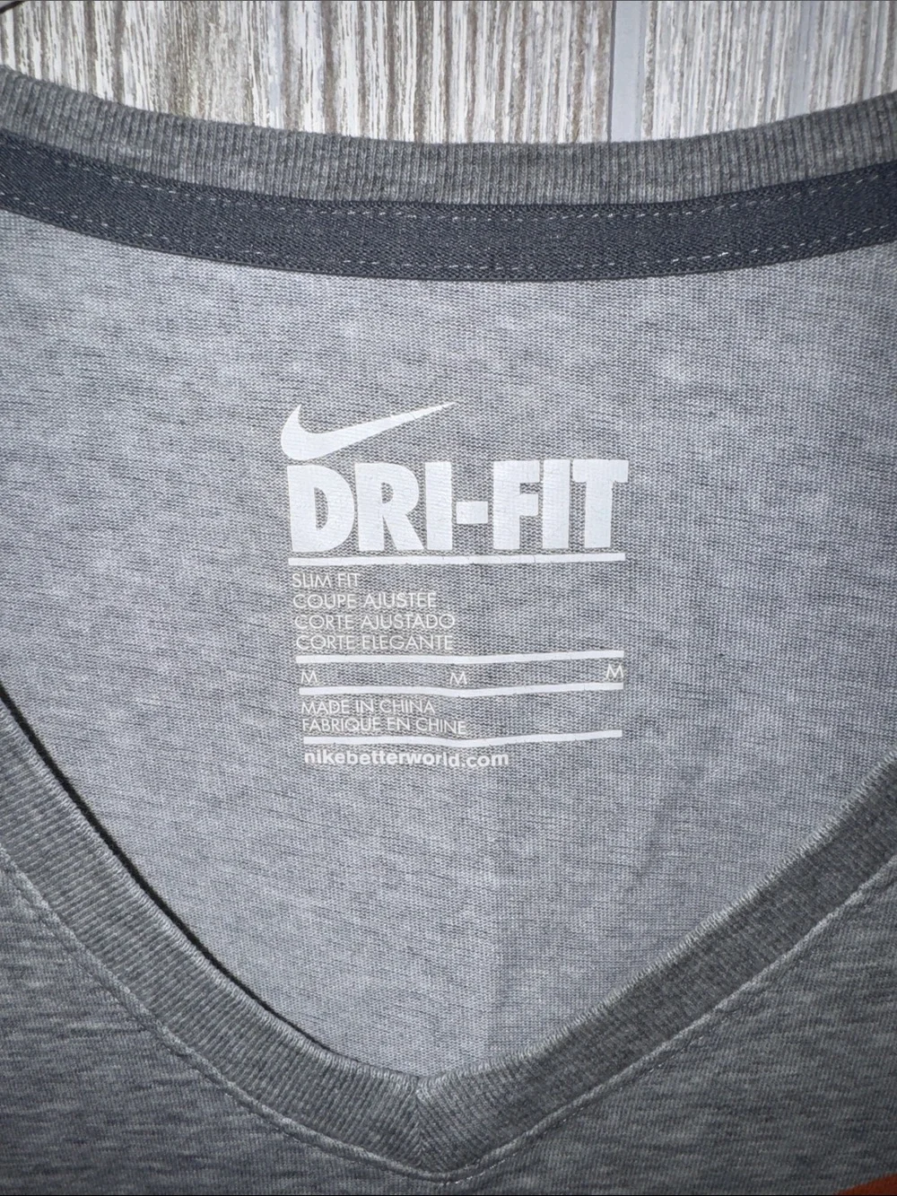 Nike Gray Dri-FIT Short Sleeve Tee with Orange Swoosh and Pink Logo